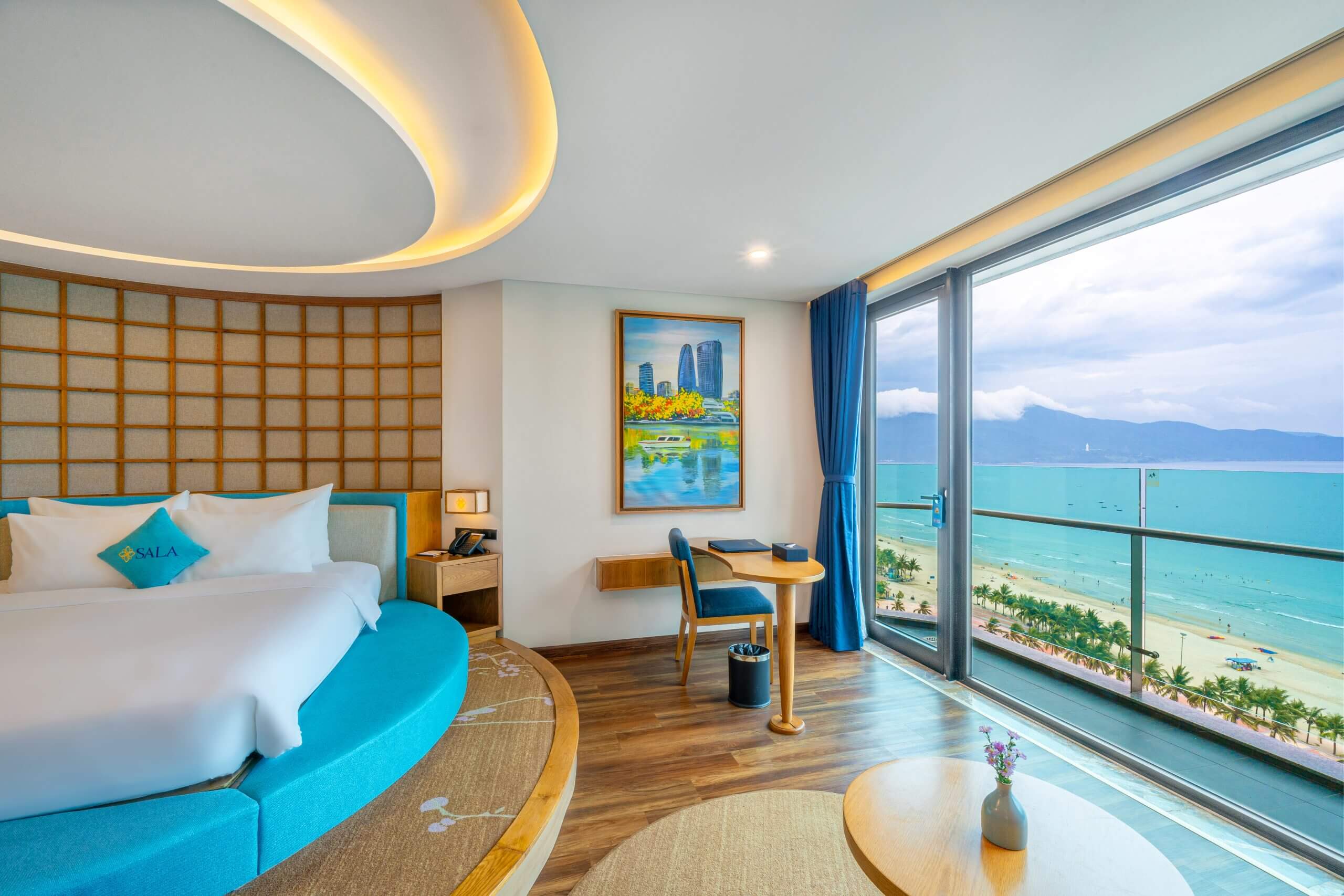 Luxurious Da Nang beach villa interior with warm lighting, wooden furnishings, and tropical garden view, dim atmospheric setting